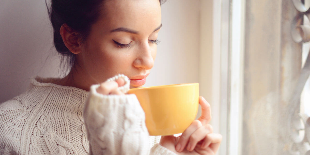 Young Woman Holding Mug